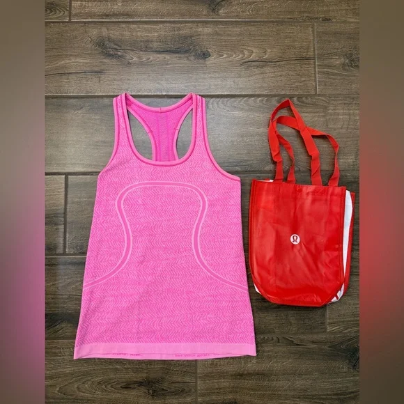 Lululemon Swiftly Tech Racerback Tank Top
Heathered Raspberry Glo Light - Picture 1 of 5